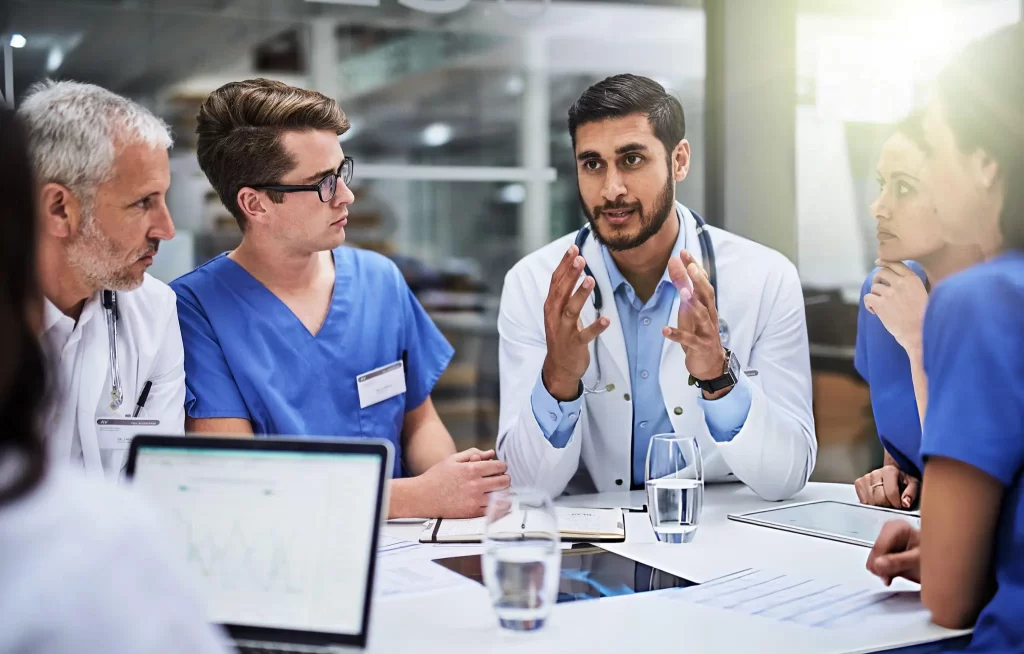 Medical team discussing a patient's bone marrow stem cell treatment plan